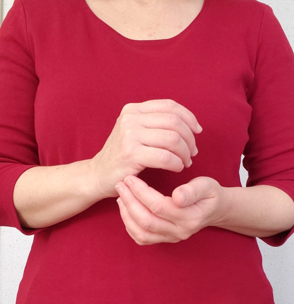 Tapping on side of hand point during a round of Emotional Freedom Techniques. Tips for more effective tapping with EFT.